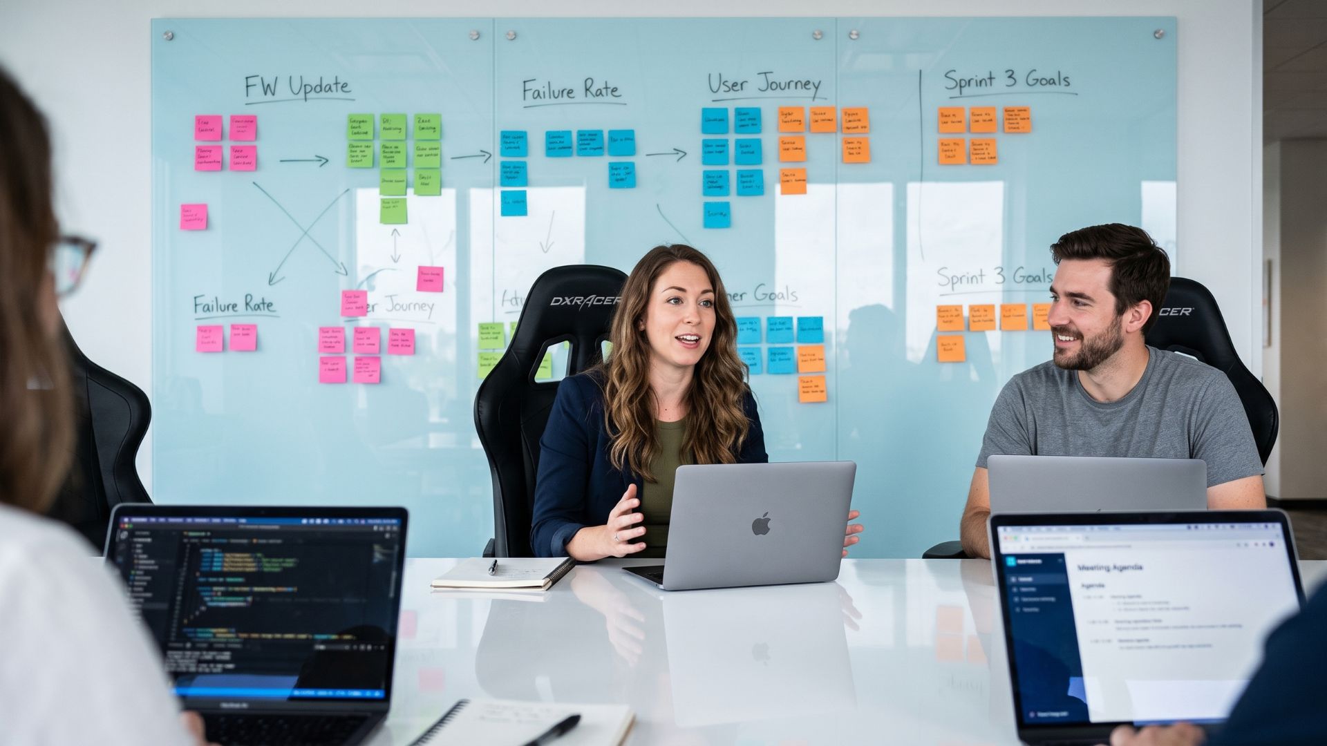 A team reviewing a course storyboard mapped out on sticky notes across a glass wall in a meeting room
